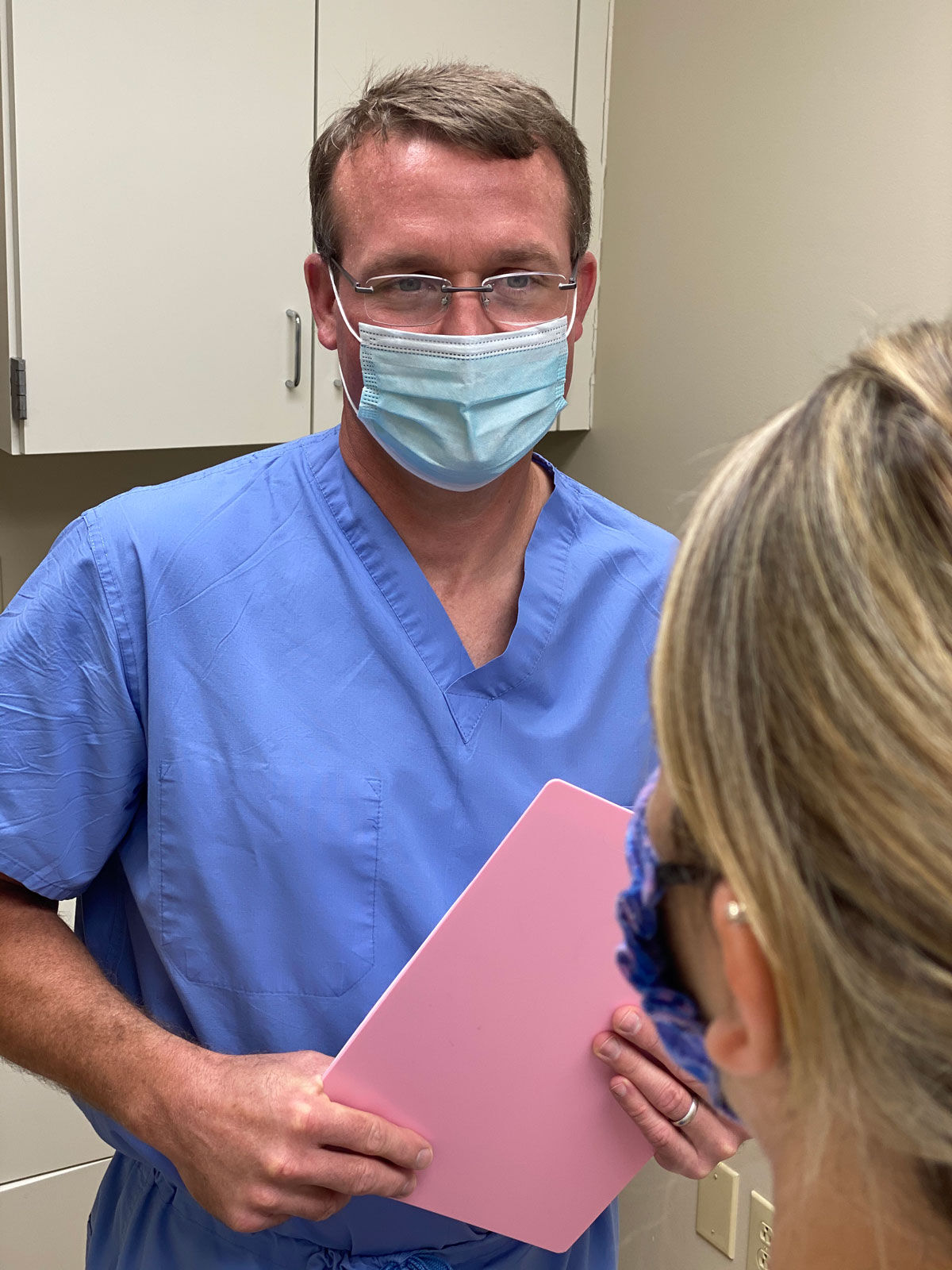 Dr. Chip Wall with patient